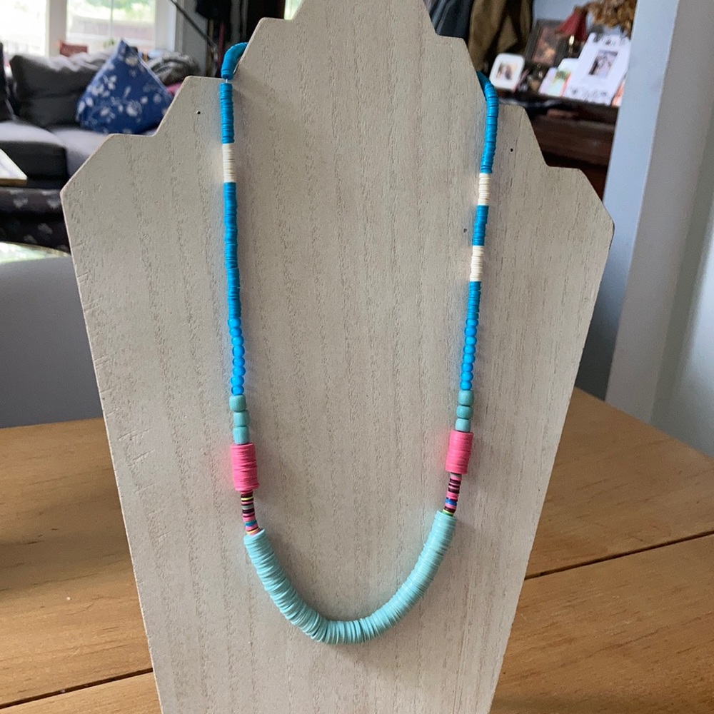 Handmade African vinyl beaded necklace.